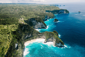 Bird's-eye view. Aerial drone view of cliff near Kelingking beach. Manta Bay or Kelingking Beach on Nusa Penida Island, Bali, Indonesia.