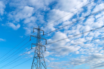 Electric post and beautiful blue sky with clouds background.Grantham Canal,Uk.