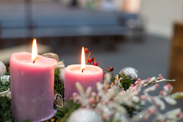 christmas table decoration with burning candle