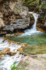 Mountain waterfalls in early spring.