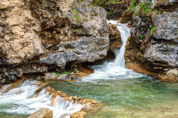 Mountain waterfalls in early spring.