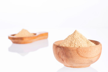 Organic maca powder - Lepidium meyenii. White background
