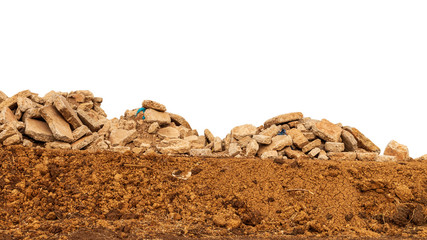 Isolated view of concrete debris piles on the ground.