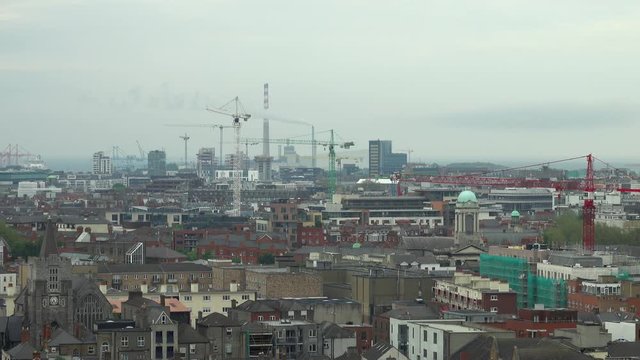 The rooftop cityscape of Dublin, Ireland is shown on an cloudy day.
