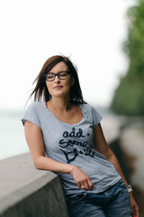 Fototapeta premium Happy young woman portrait taken on the baltic sea coastline during summer. 