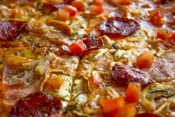 Tasty delicious pizza close-up.