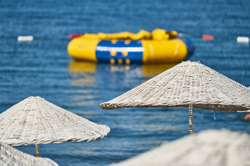 Sun umbrella and beach background