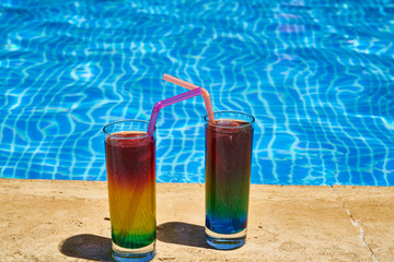 Tasty alcoholic beverage and pool view
