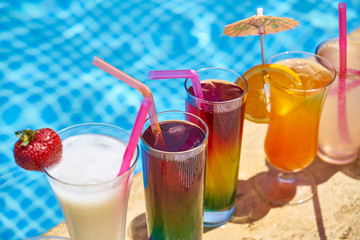 Tasty alcoholic beverage and pool view