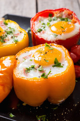 Baked pepper stuffed with bacon and eggs