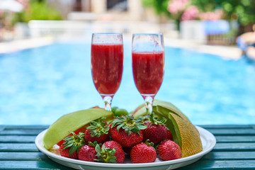 Delicious fresh fruits and pool
