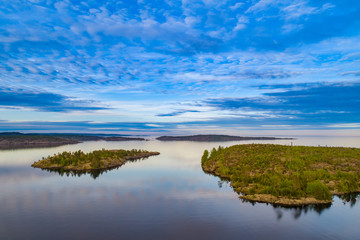 Republic of Karelia. Russia. Panorama of Karelian Islands in Ladoga. Ladoga lake skerries. Karelian water area view. Islands in Lake Ladoga. Nature scenery of Russia. Karelian landscapes.