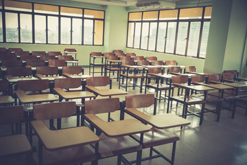 Vintage image of Desk and chairs in classroom