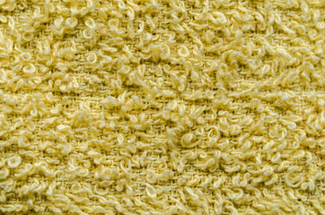 The texture of the carpet is yellow. background