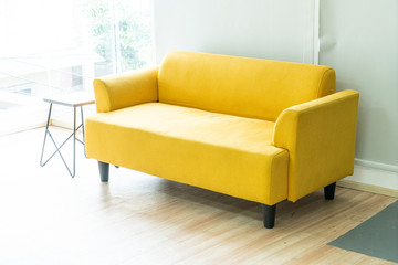 empty yellow sofa
