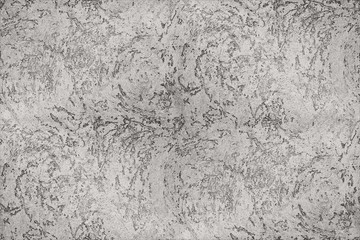 Raw gray cement wall with the many scratched pattern as abstract textured and background