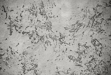 Raw gray cement wall with the many scratched pattern as abstract textured and background