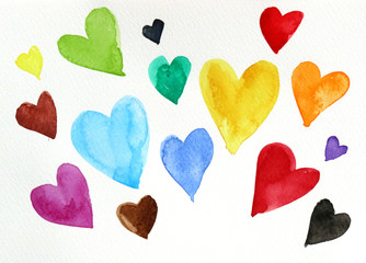 watercolor of many color hearts on white paper