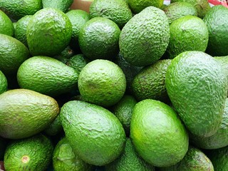 Soft focus of fresh avocado as a background for sale in the supermarket, ready to eat or making drinks and salads