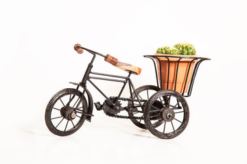 Fototapeta na wymiar black metal cycle rickshaw, bangladesh & india eco friendly vehicles toy