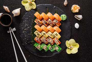 sushi on the black background