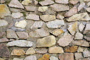 old stone wall of stones