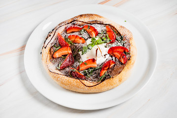strawberry pizza with chocolate and ice cream