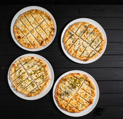 tasty pizza on the black background