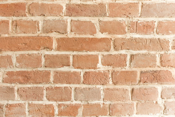 Brick wall texture. Old rough brown brick wall background.