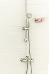 Shower faucet in a shower room. Modern shower room equipment.