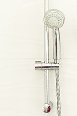 Shower faucet in a shower room. Modern shower room equipment.