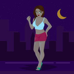Prostitute girl standing on street at night