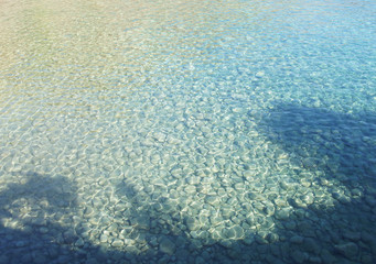 Blue azure lagoon with clear water on the sea coast.