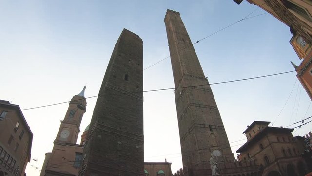 Asinelli and Garisenda towers in Bologna, Italy, on a sunny day