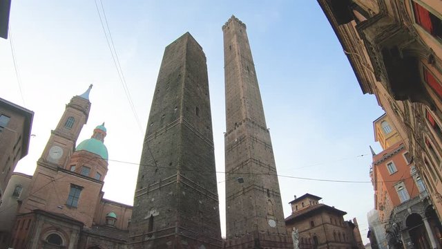 Asinelli and Garisenda towers in Bologna, Italy, on a sunny day