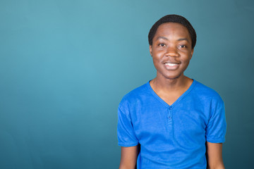 Obraz premium Portrait of happy young african guy with his arms crossed