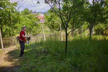 Man mowing his lawn
