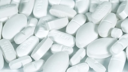 Coronavirus medicine. Healthcare medical concept of the pharmaceutical RX prescription drugs on the pharmacy counter with money syringe and pill container. Coronavirus Pills.