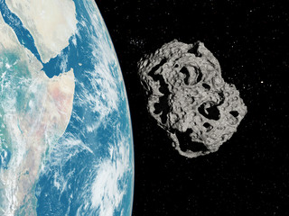 3d rendered illustration of an asteroid infront of the earth