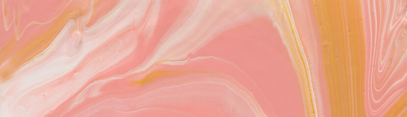 photography of abstract marbleized effect background. gold, yellow, orange and white creative colors. Beautiful paint