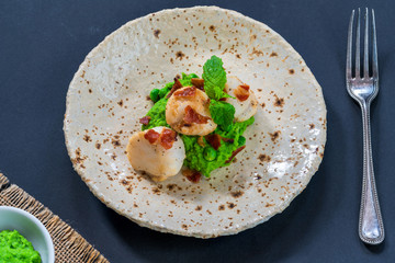 Scallops with minted peas and crispy pancetta - overhead view