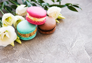 Colorful macaroons and flowers