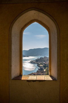 Fototapeta View of Cernobbio from the window of an abandoned fortress tower. Lake Como, Northern Italy.