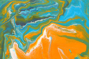 photography of abstract marbleized effect background. gold, yellow, blue and green creative colors. Beautiful paint