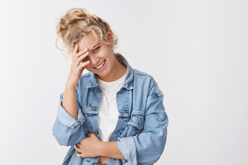 Carefree smiling blond attractive girl chuckling blushing looking flirty love communicating talking...