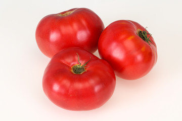 Red ripe tomato isolated on white