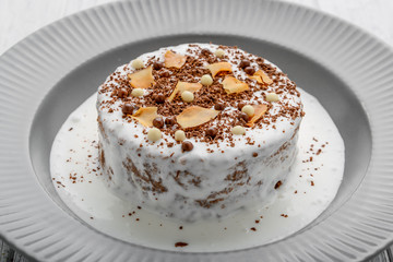 Meringue cake with chocolate cream and healthy food