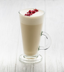 Coffee drinks with cream in glass on white background