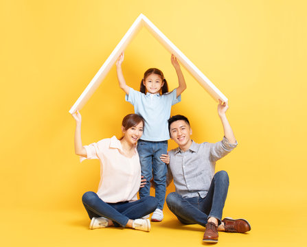 Happy Asian Family  In New House With Roof Concept