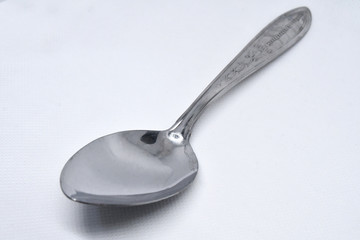 Retro style spoon isolated on white